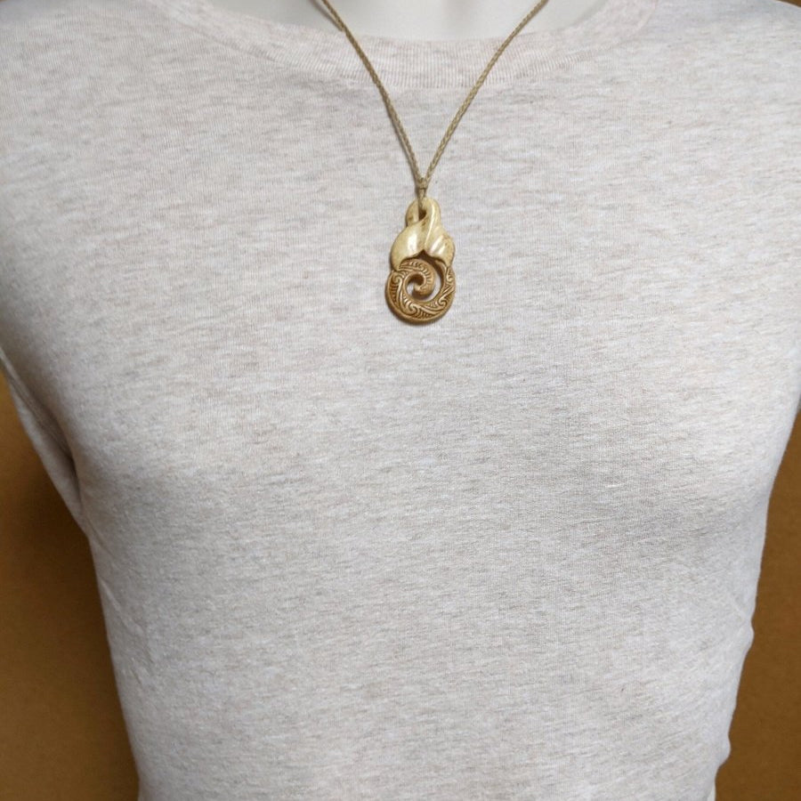 Hand Carved Bone Infinity Spiral with Stylized Whale Tail Necklace PNK545AT Earthbound Pacific