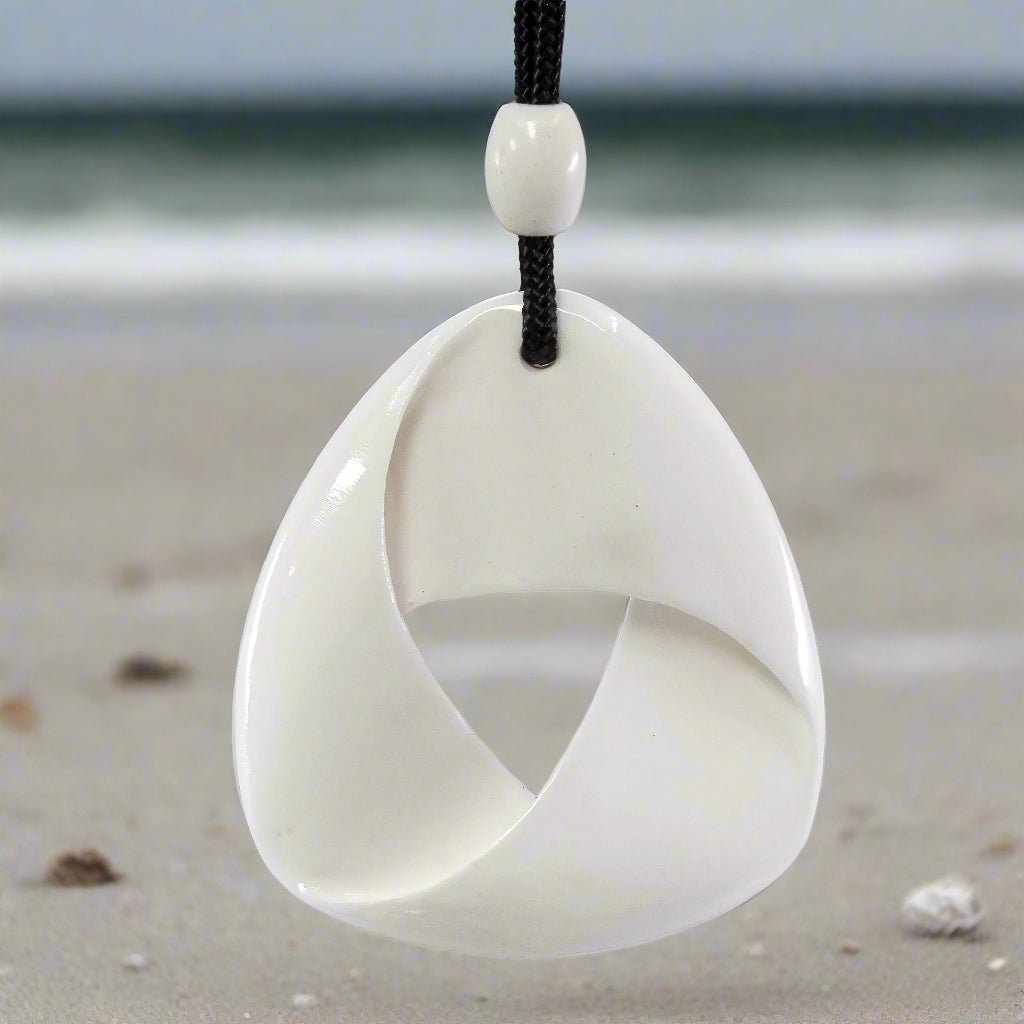 Hand Carved Bone Maori Inspired Mobius Strip Necklace MOB45w Earthbound Pacific